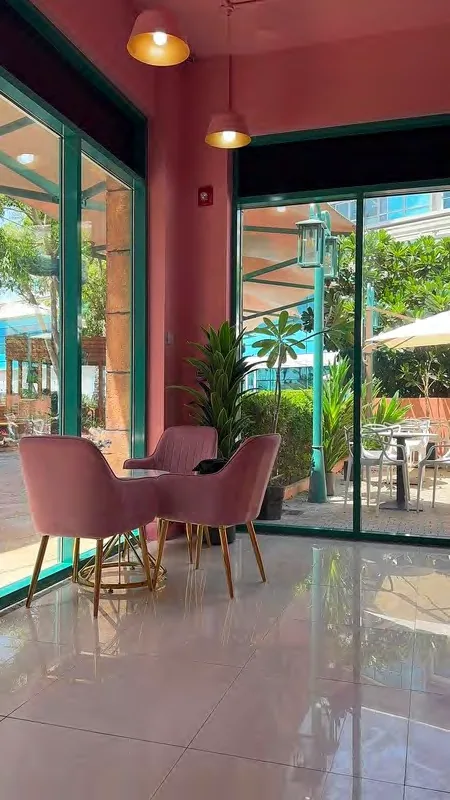 Pink velvet seating inside Yogurtberry